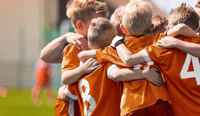 bigstock-Boys-Soccer-Football-Team-Hudd-288936550