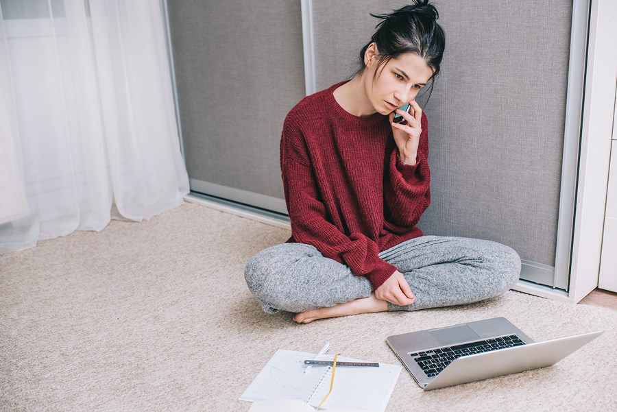 bigstock-Worried-And-Serious-Woman-Sitt-260139229